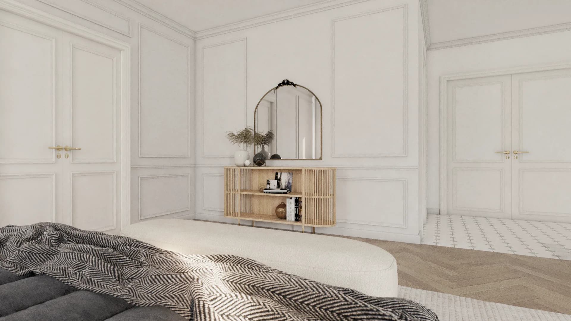 Primary bedroom showing paneled double doors, arched mirror, and herringbone floor