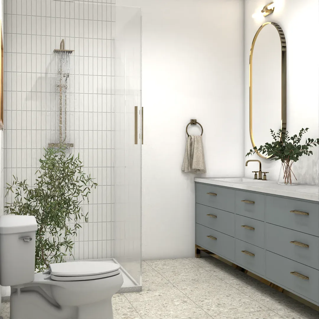 Blue-gray vanity bathroom with terrazzo floor, oval brass mirror, and glass shower in whole home design