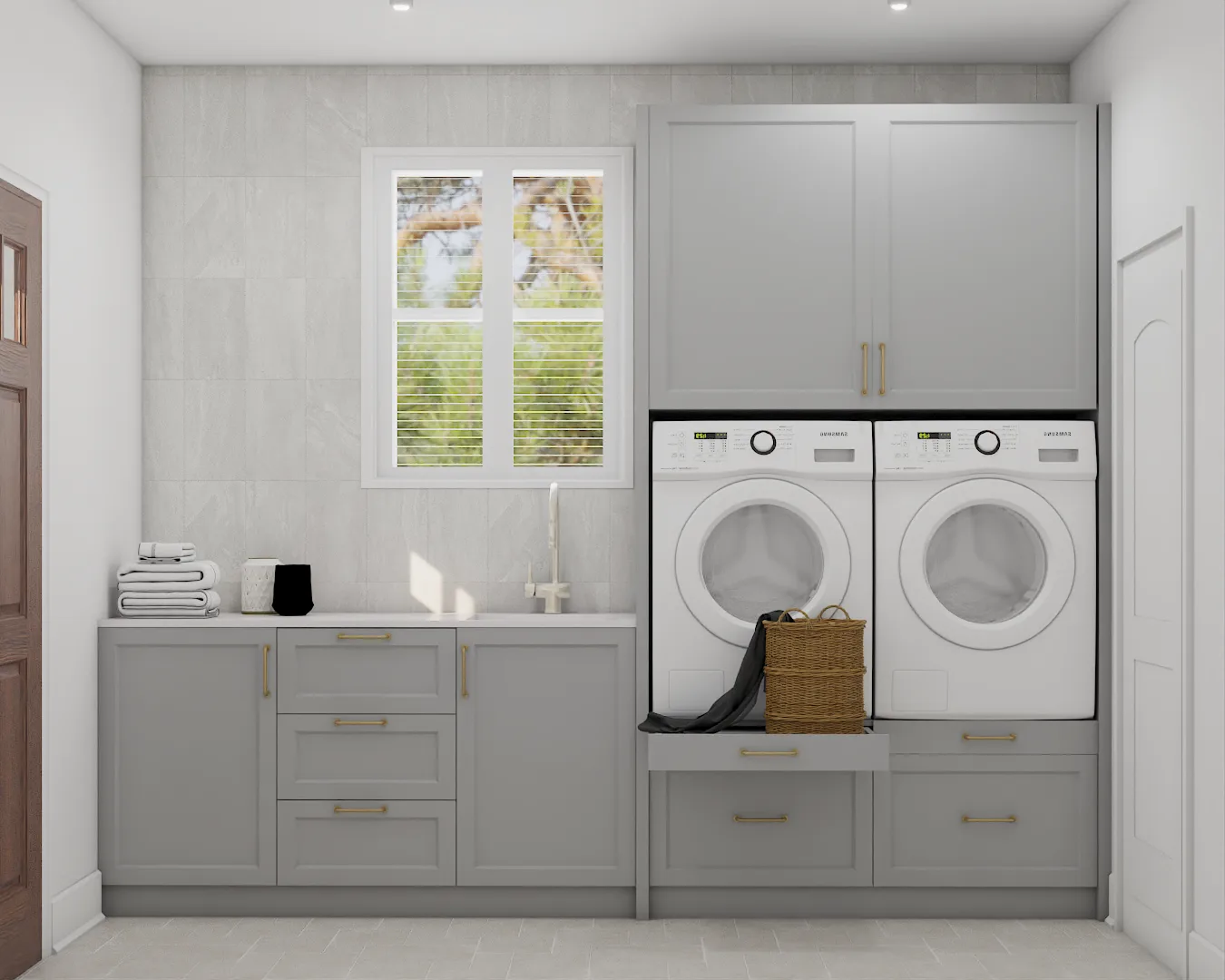 Laundry room with gray shaker cabinetry, stacked washer and dryer, and upper storage cabinets