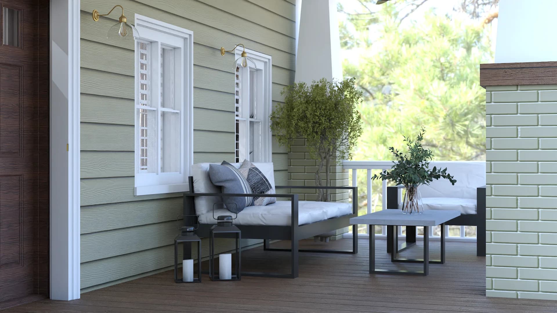 Craftsman home front porch with sage green siding, metal outdoor sofa, brass wall sconces, and white porch railings