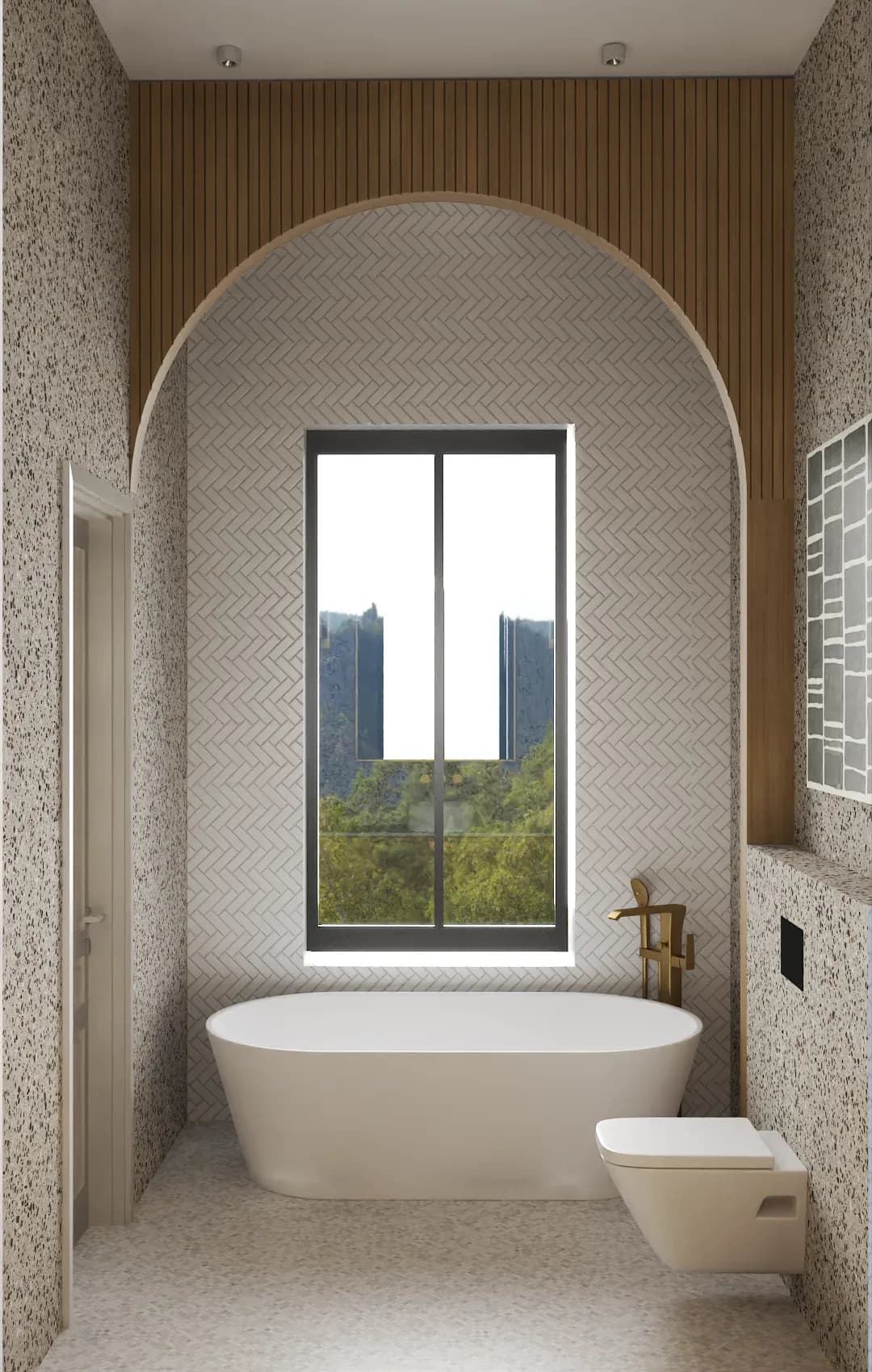 Terrazzo bathroom with freestanding tub in arched niche and gold fixtures