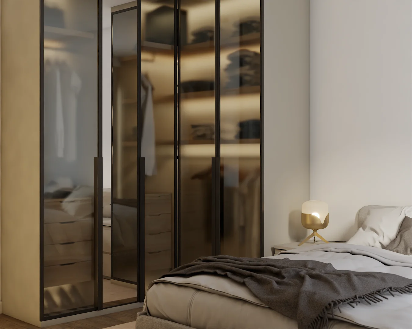Bedroom with smoked-glass walk-in closet doors, gold lamp, and cream platform bed