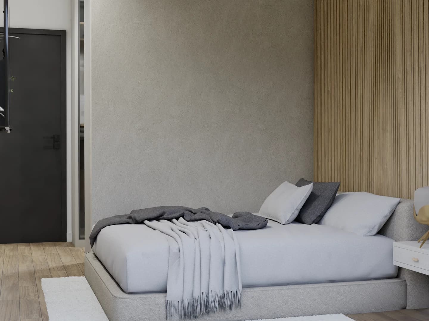 Bedroom with low cream platform bed, slat accent wall, and black door at left in textured wall