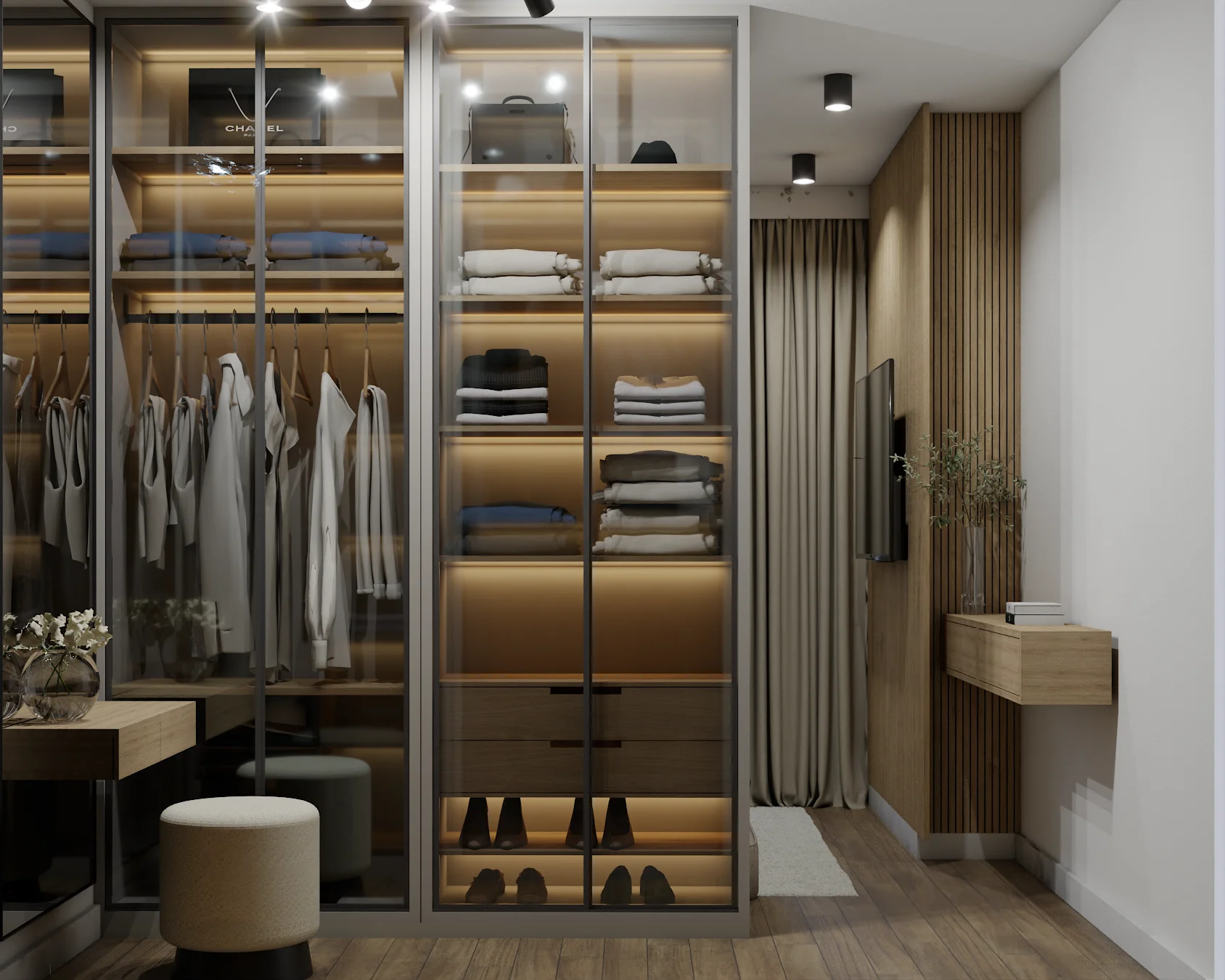 Dressing room with smoked-glass wardrobe, vanity, mounted TV on oak slat wall, and boucle pouf