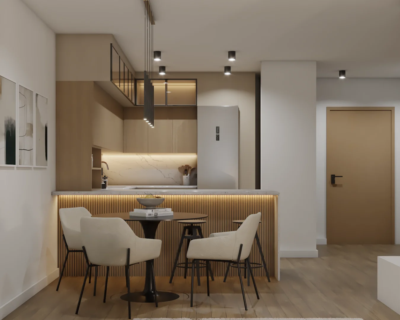 Dining nook with two boucle chairs, round black-leg table, and oak kitchen with marble splash