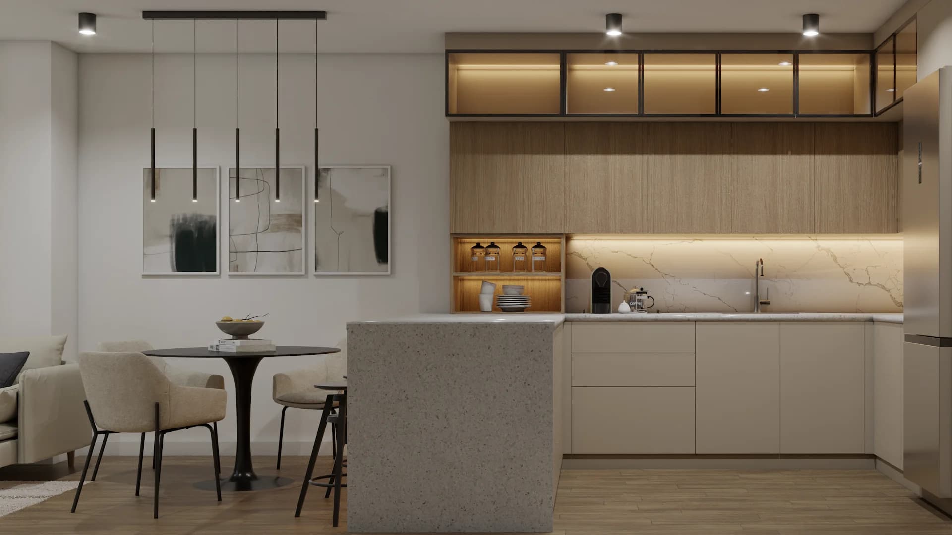 Oak kitchen with terrazzo waterfall island, five tube pendants, and framed art on cream wall