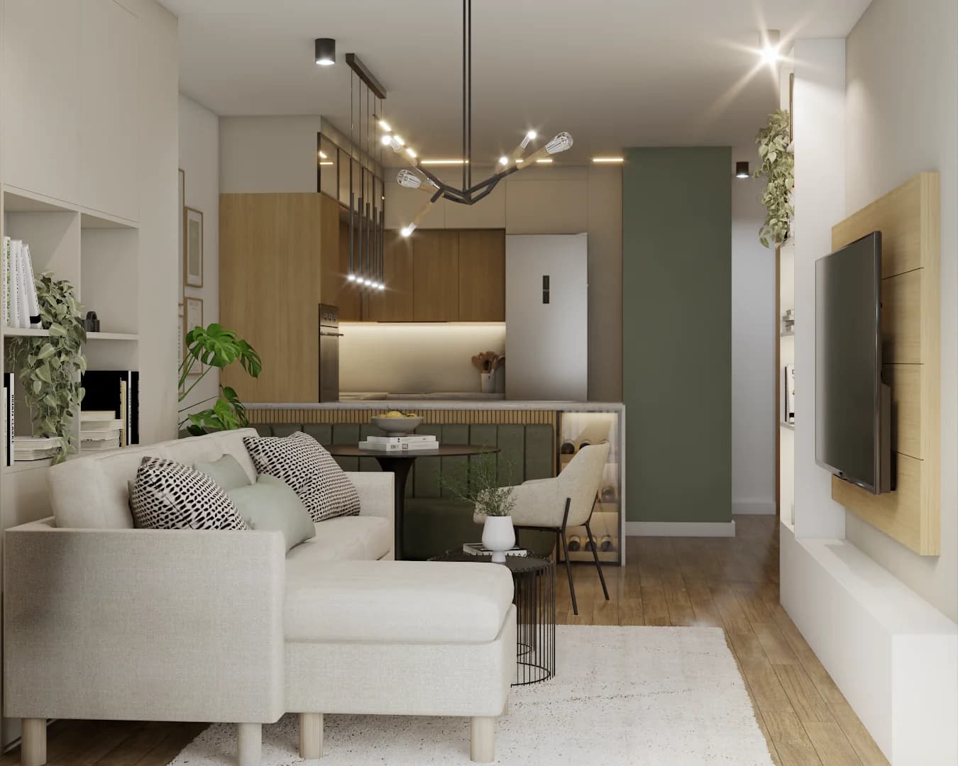 Aerial view of cream sectional, mounted TV, sage velvet banquette, and open kitchen beyond