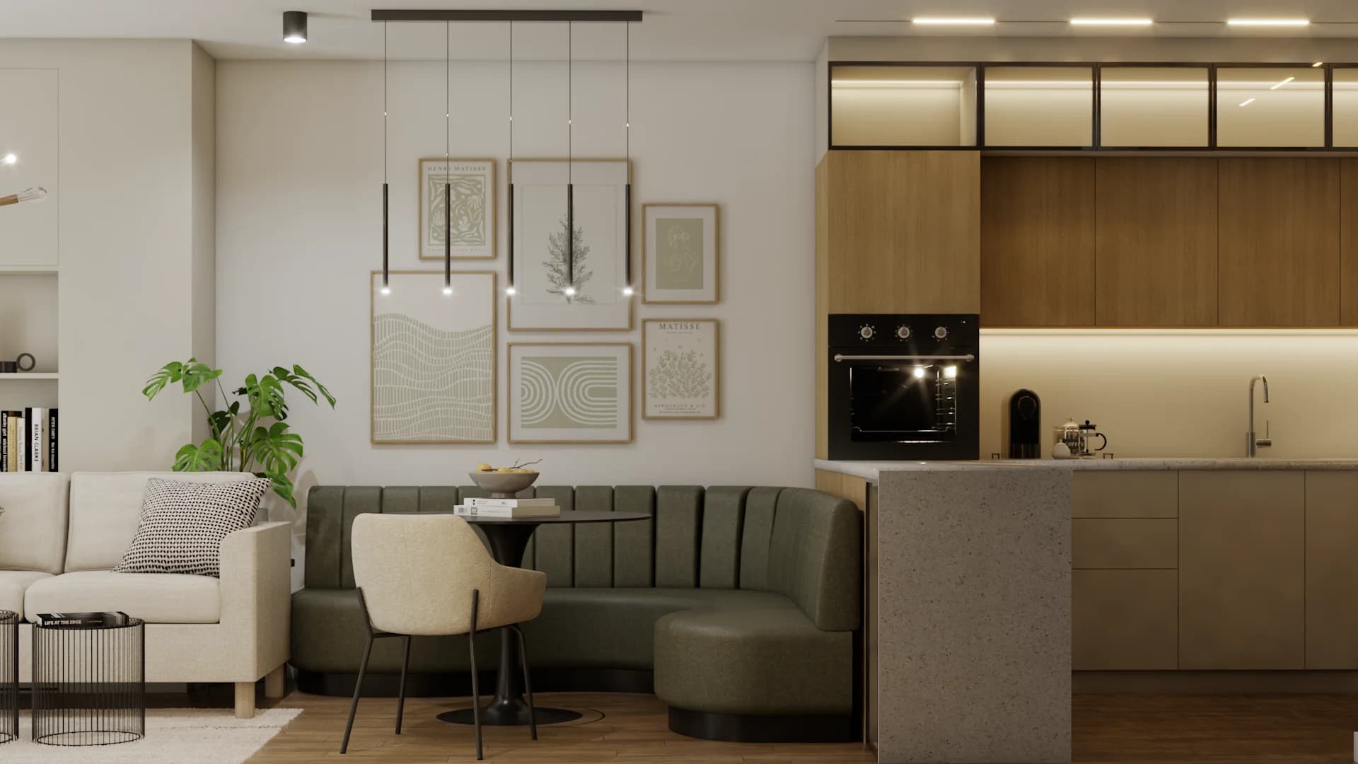 Curved sage velvet banquette dining with five black pendants and oak kitchen with built-in oven