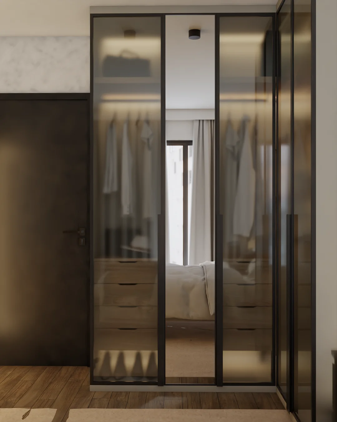 Walk-in closet with smoked-glass doors, mirrored panel reflecting bed, and integrated drawers