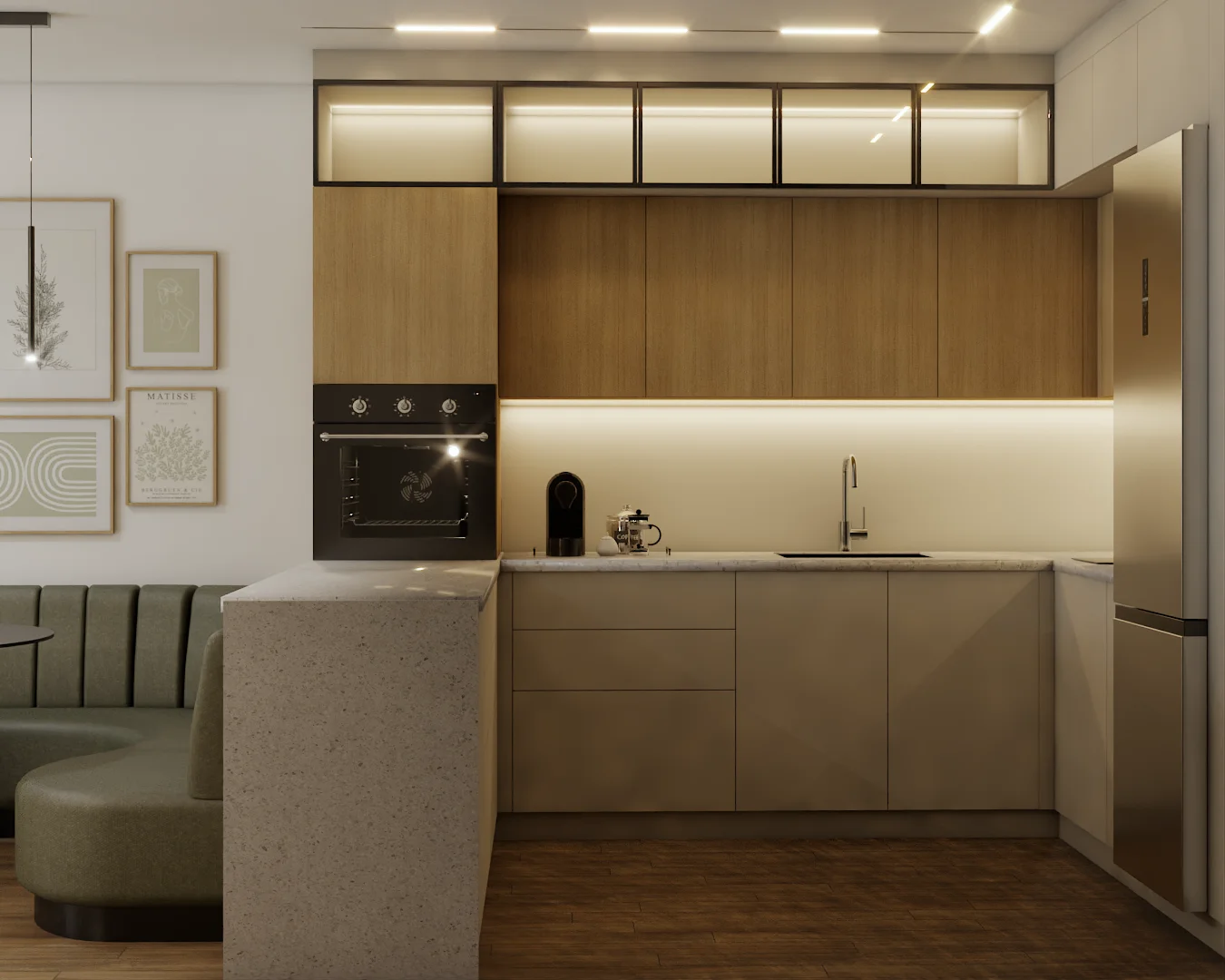 Light oak kitchen with black oven, terrazzo island, and white framed art on side wall