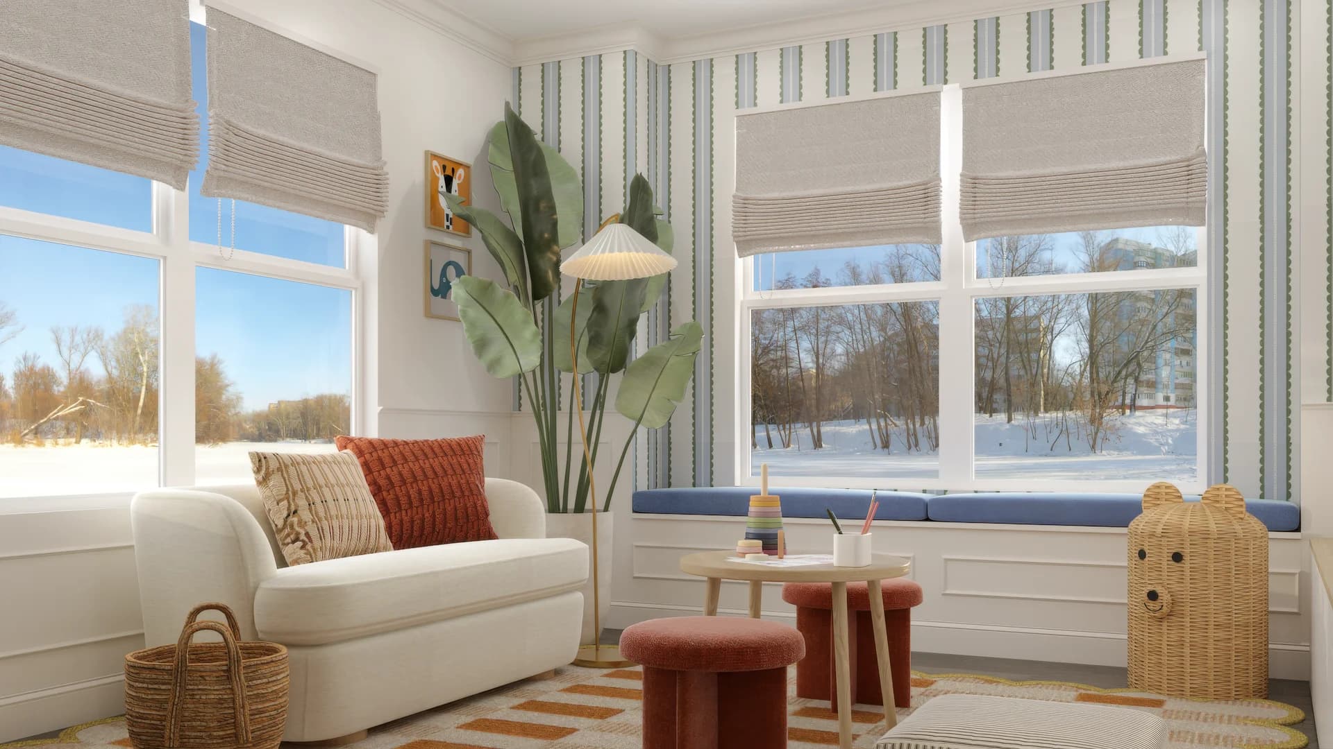 Kids playroom with blue and white vertical stripe wallpaper, cream sofa with rust pillow, wicker bear basket, striped area rug, small round play table with terracotta stools, and blue window seat bench with roman shades.