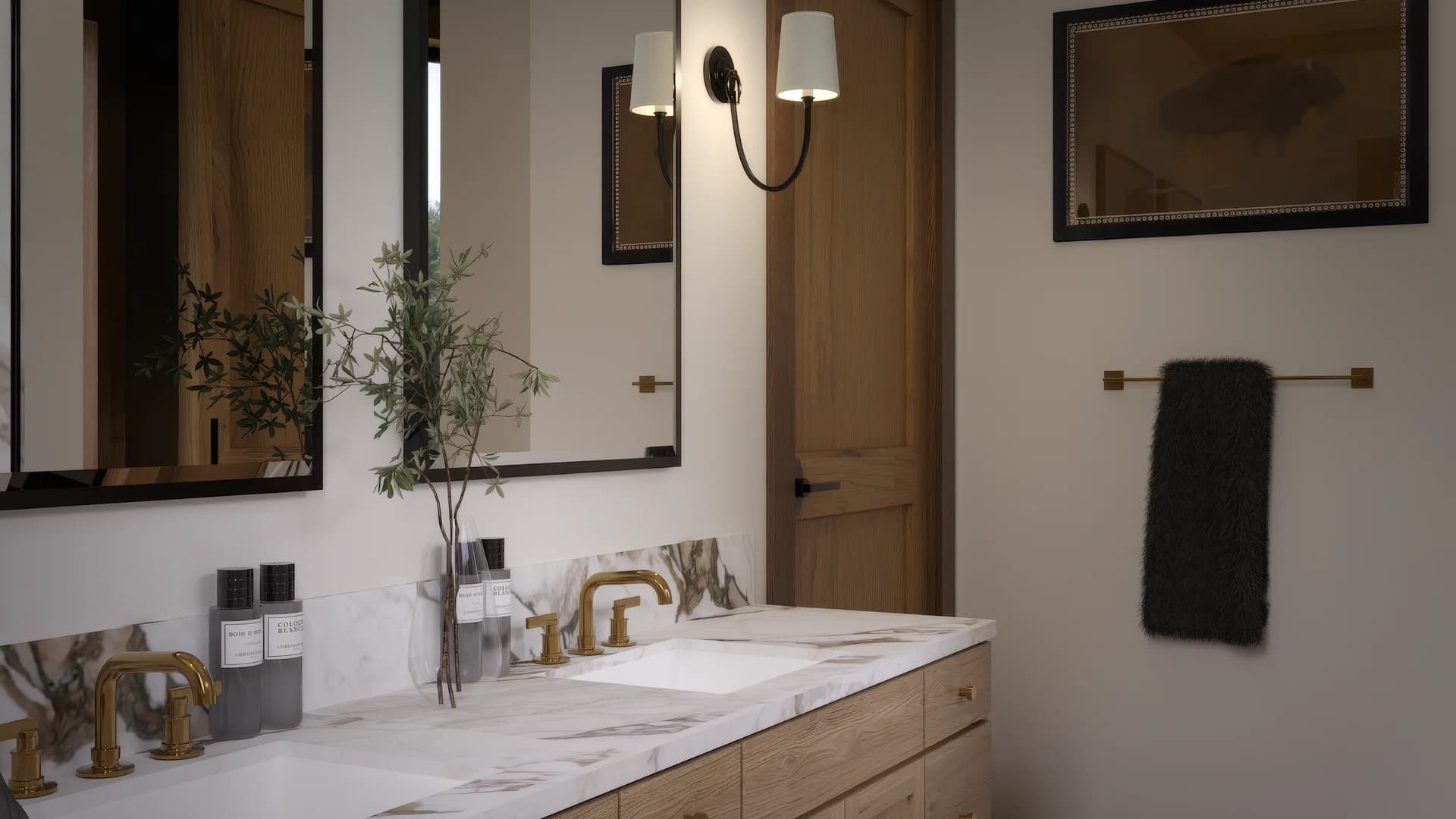 Master bathroom oak double vanity with calacatta marble top, gold bridge faucets, black-framed mirrors, white sconces, dark towels on brass bar, and checkerboard marble floor