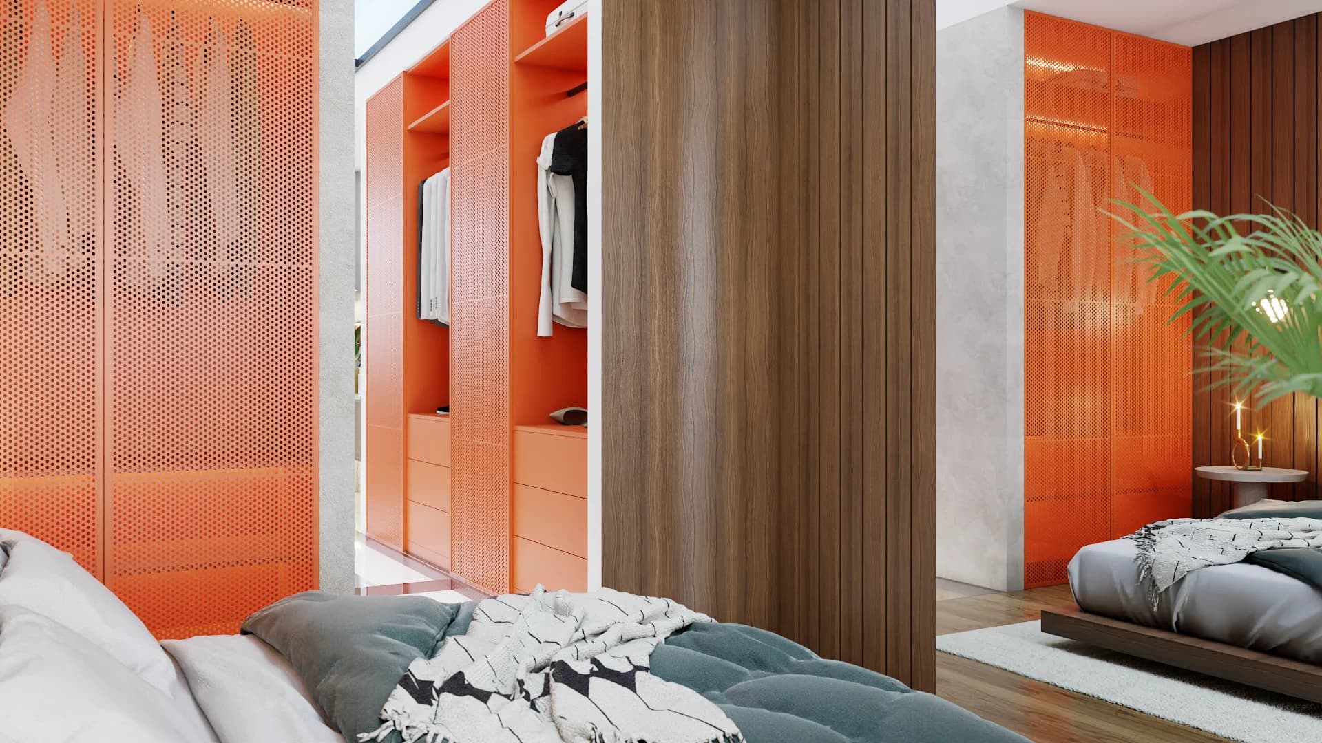 Master bedroom with bold orange built-in closet system, perforated orange accent wall panel, walnut wood column divider, tufted gray upholstered bed, white area rug, and tropical plant visible in mirror reflection