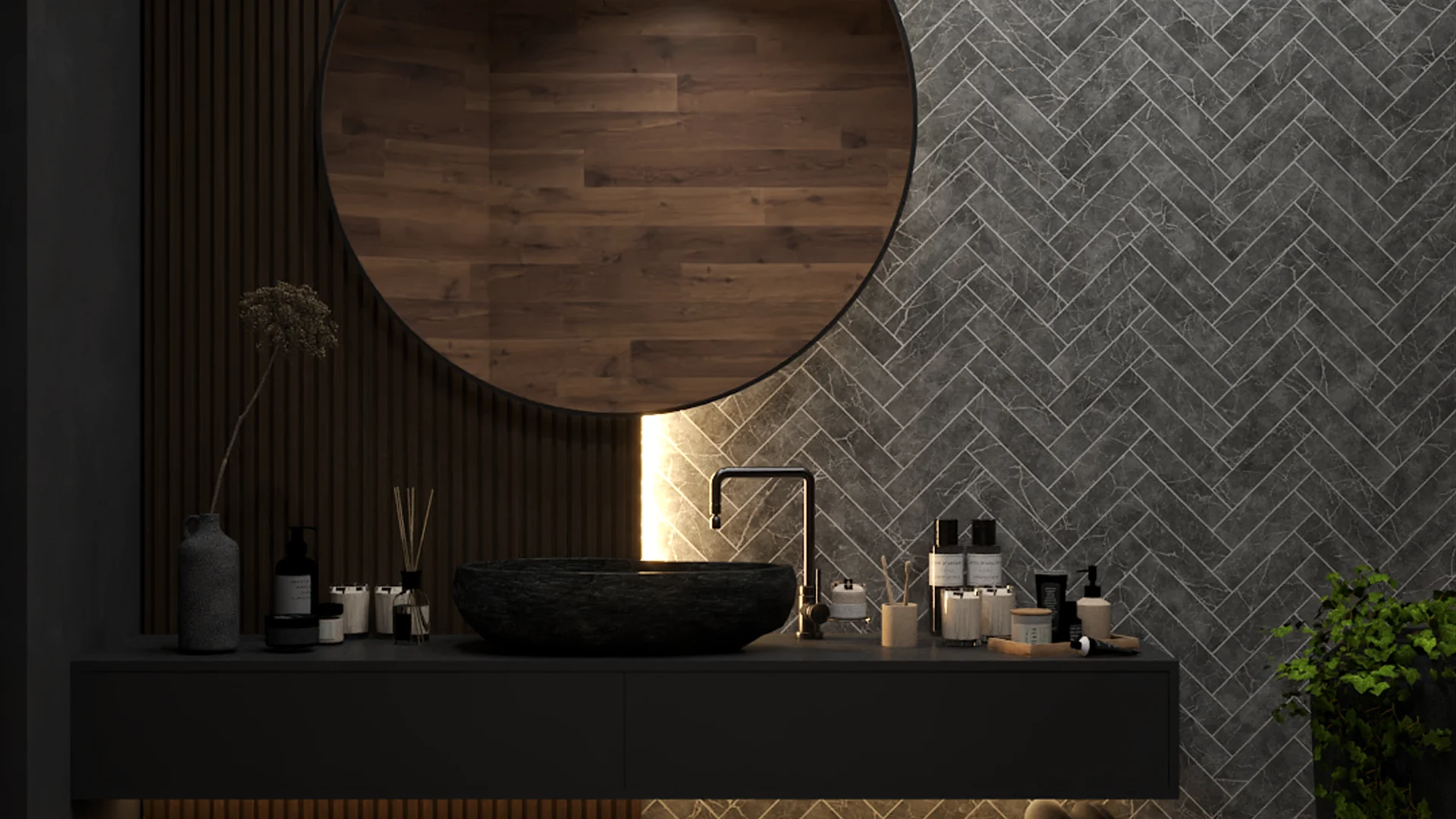 Bathroom vanity with wood slat wall, round mirror, dark stone vessel sink, and herringbone tile