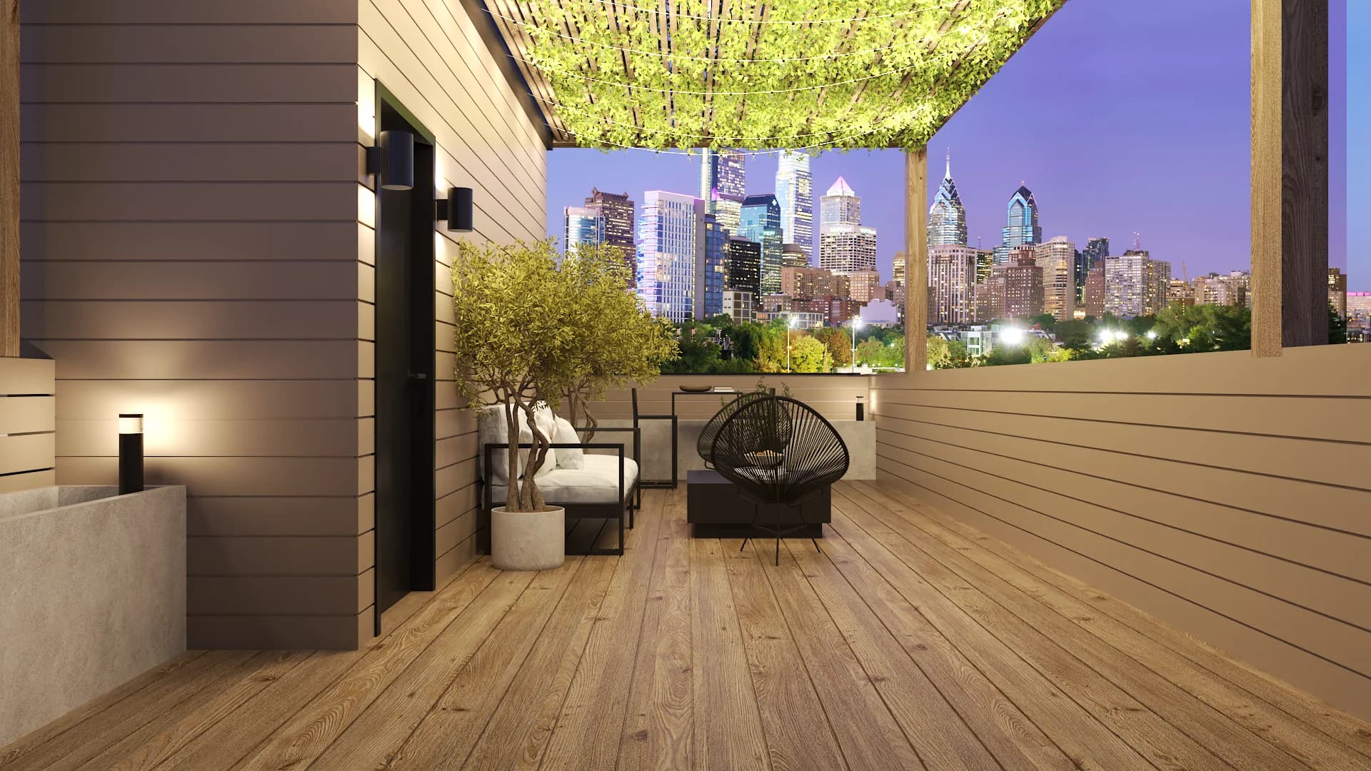 Rooftop terrace with vine pergola, white sofa, Acapulco chairs, olive tree, and Philly skyline