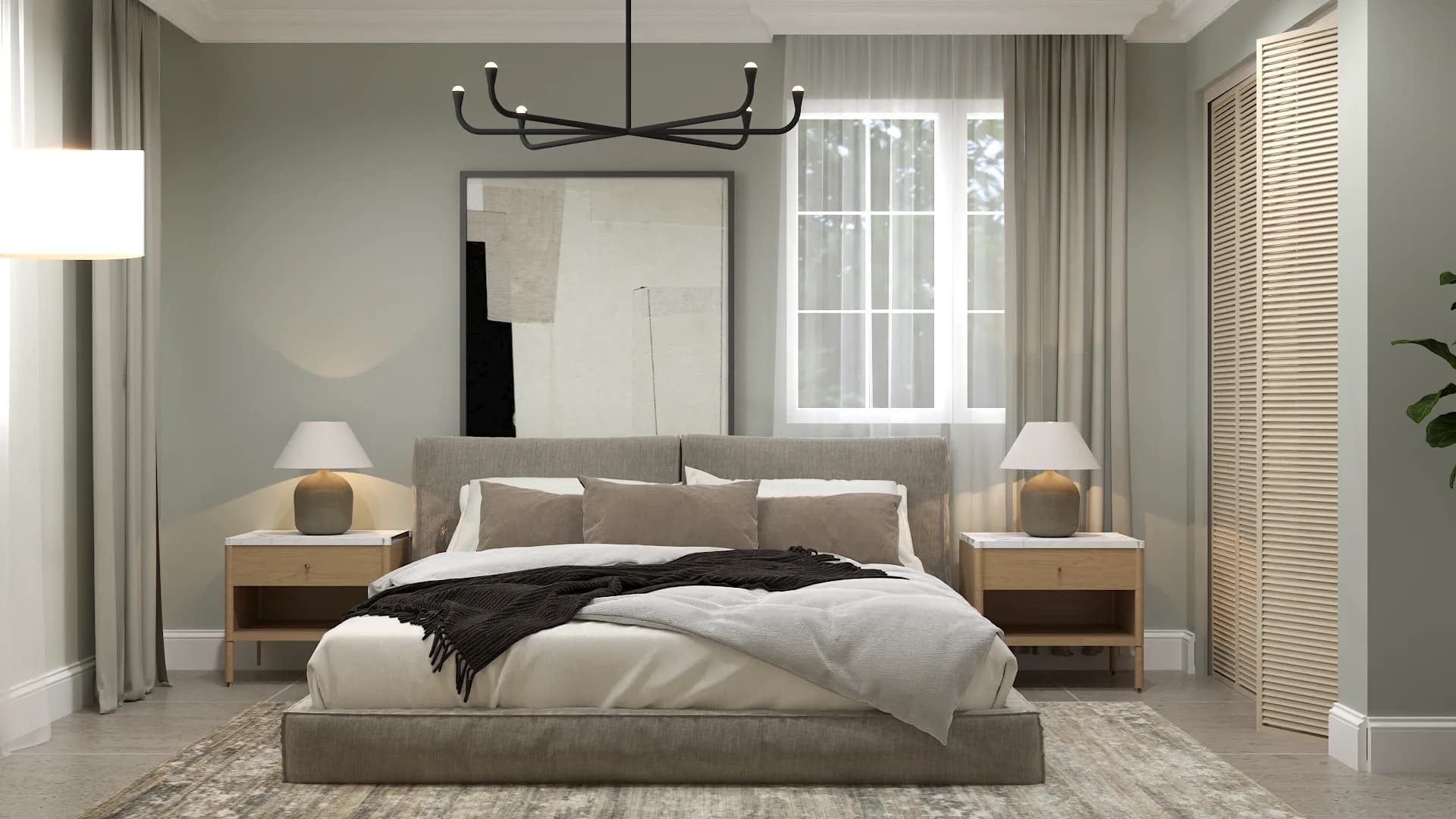 Sage green bedroom with low platform bed, black chandelier, and oak nightstands