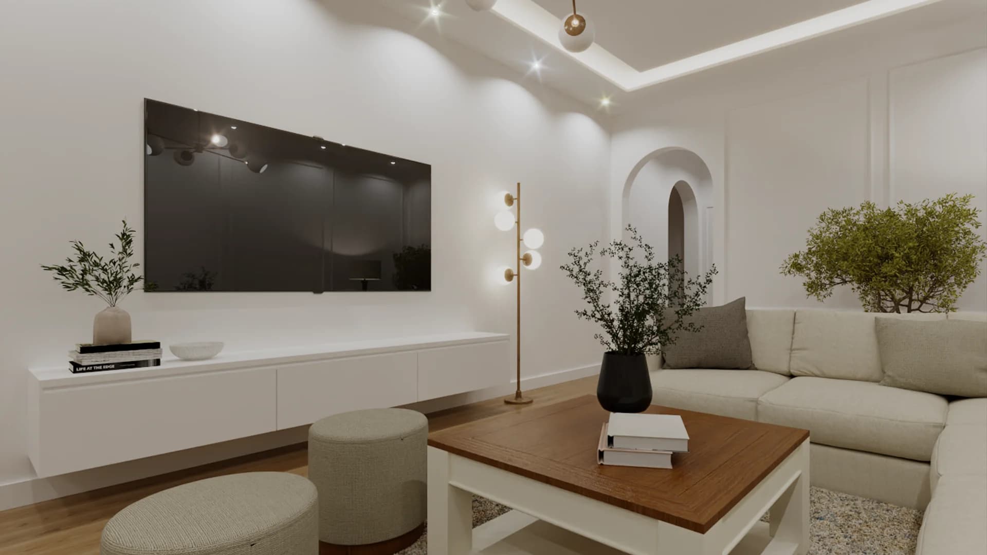 White living room with wood coffee table, floating TV console, and arched doorway accent