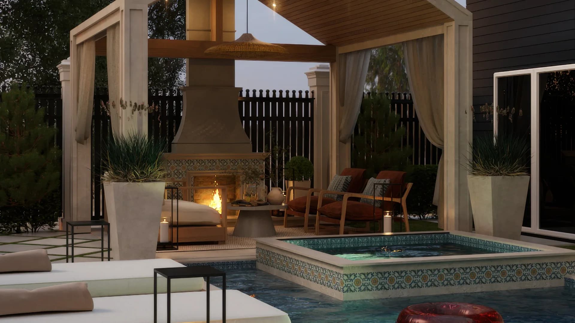 Mediterranean pool patio at dusk with gabled cabana, mosaic tile pool, stone pavers with grass inlay, fire bowls on stone retaining wall, and palm tree landscaping