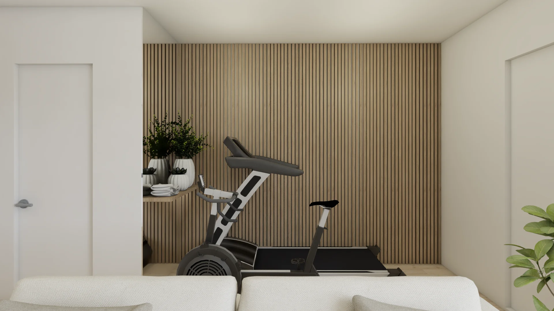 Living room sofa view with gym wall in background