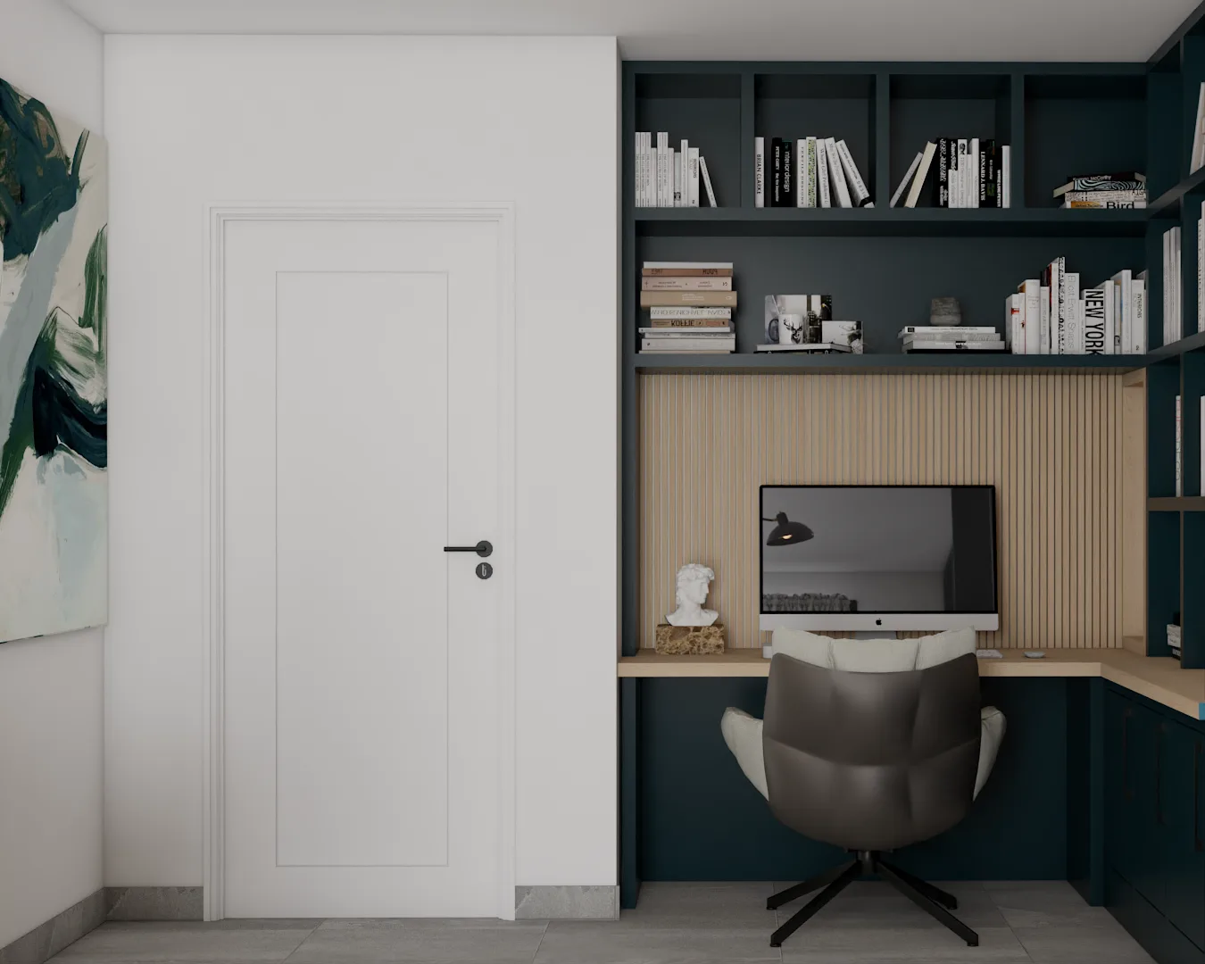 Close-up of oak desk nook with iMac, teal built-in shelving, and gray swivel chair