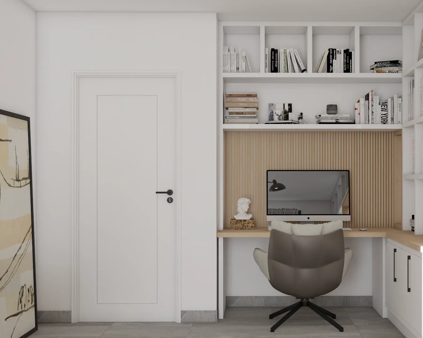 Close-up of oak desk nook with iMac, white built-in shelving, and gray swivel chair