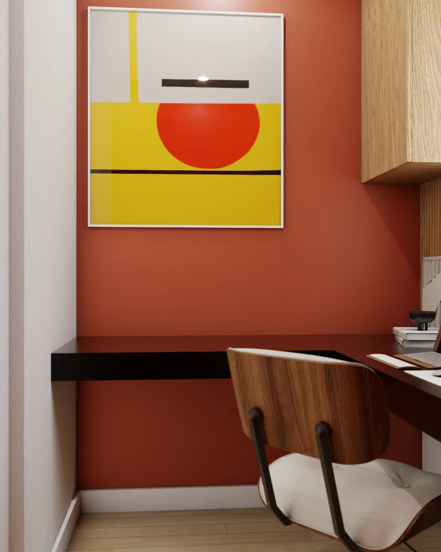 Terracotta wall with bold geometric art print above black floating desk and molded walnut chair