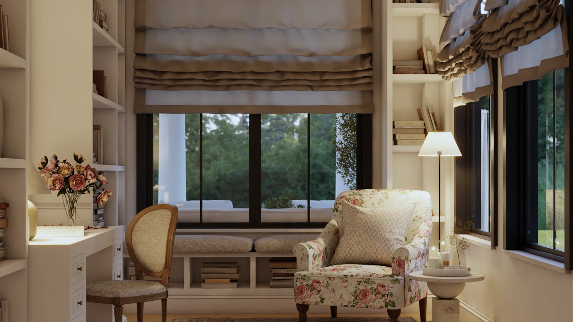 Transitional home office with window seat bench, ruffled linen Roman shades, floral armchair, white corner bookcase, cream desk chair, and pale plank flooring by Debora Interiors