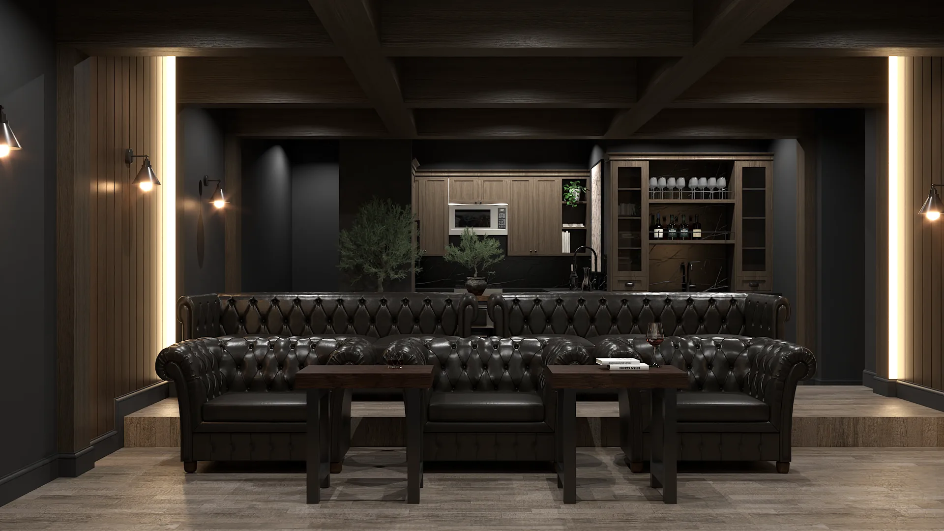 Rear theater view with black Chesterfield sofas facing oak kitchenette and illuminated wood accent panels