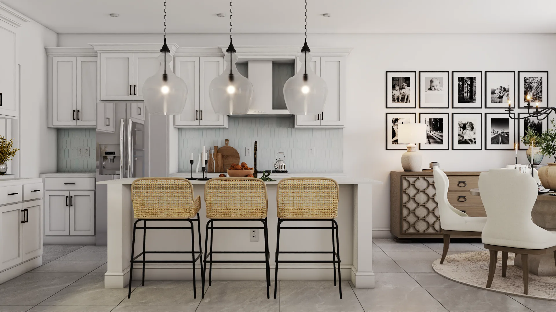 Wide view of white shaker kitchen open to dining with B&W gallery wall and wingback chairs