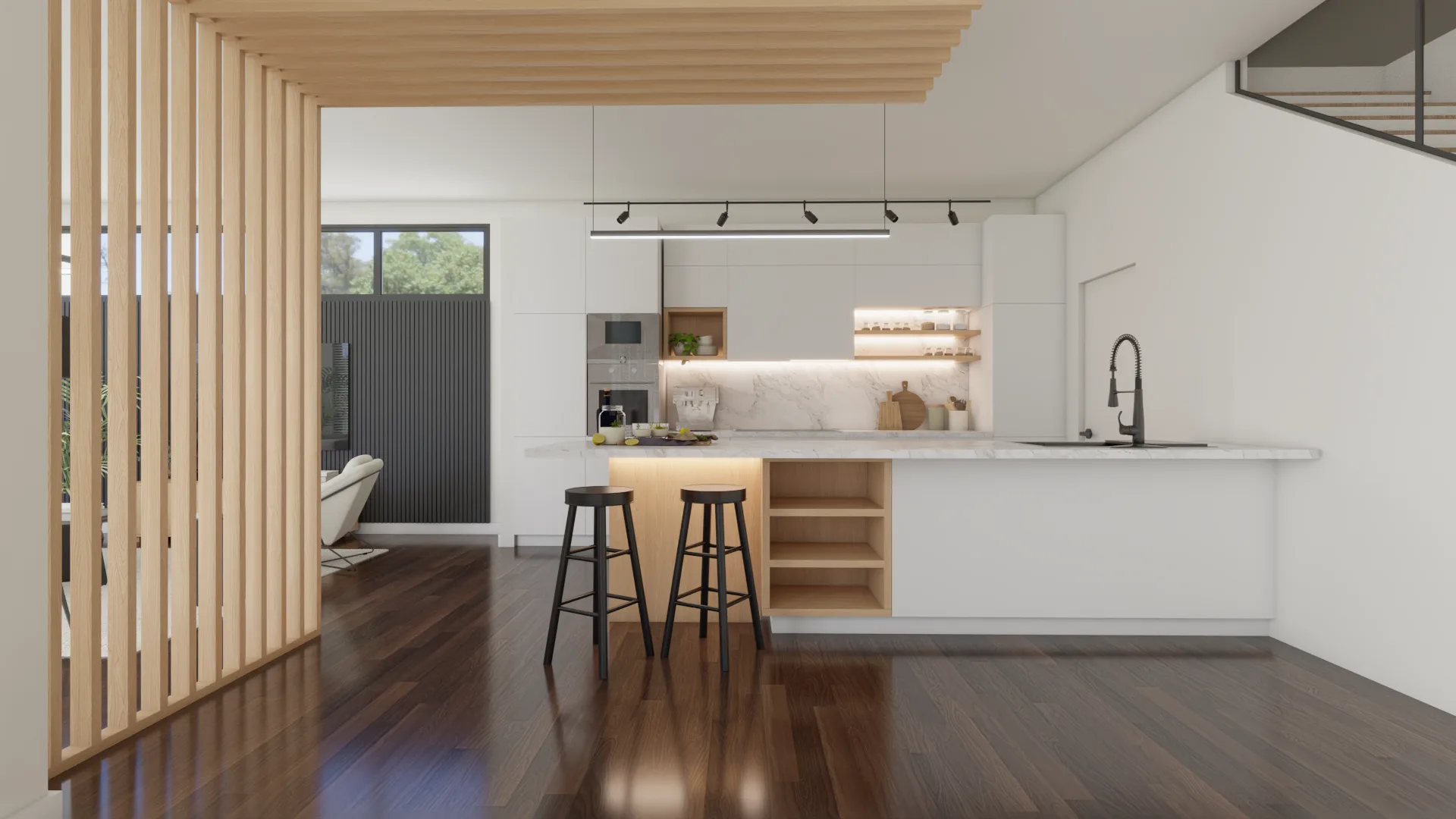 Wide view of white flat-panel kitchen from living room side showing oak slat divider, island, and tr