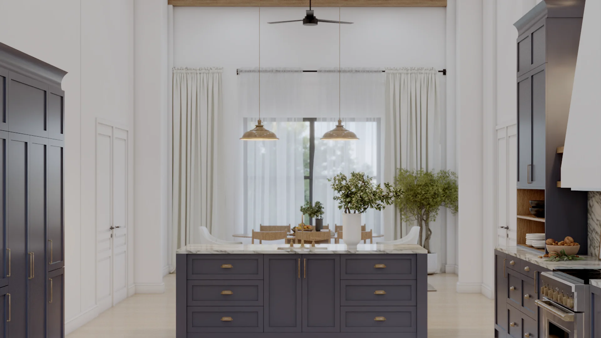 Blue shaker island with marble top and oak open shelving facing dining area with linen curtains, brass pendants, ceiling fan, and garden views through tall windows