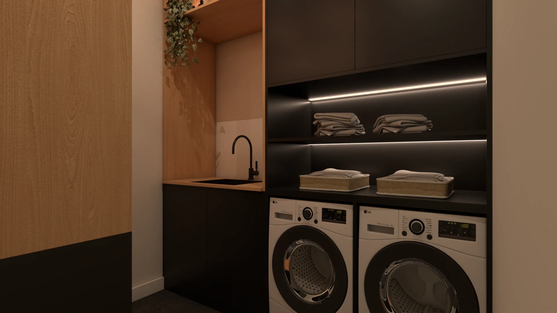 Close view of black undermount sink, trailing plant on open shelf, and LED-lit linen storage above side-by-side washer and dryer in charcoal laundry nook