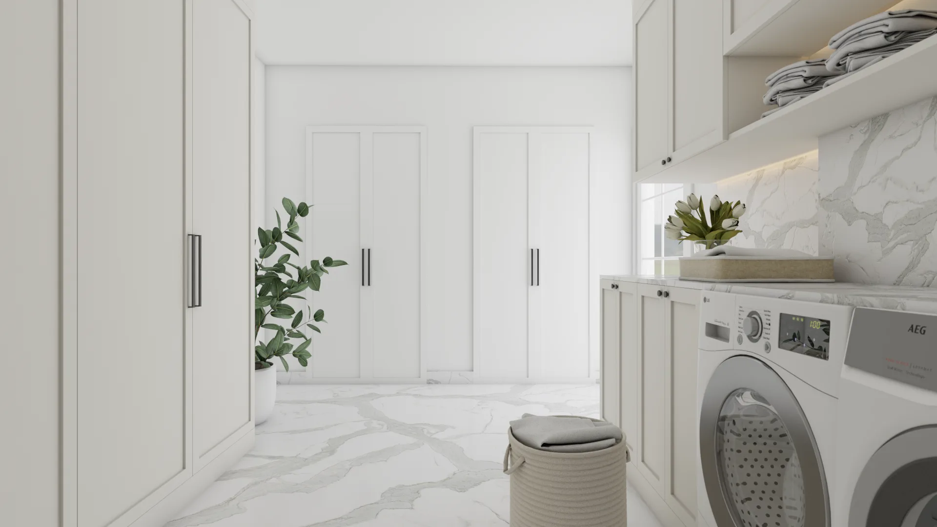 Wide view of white laundry room with marble floor, full-height cabinetry, and eucalyptus plant