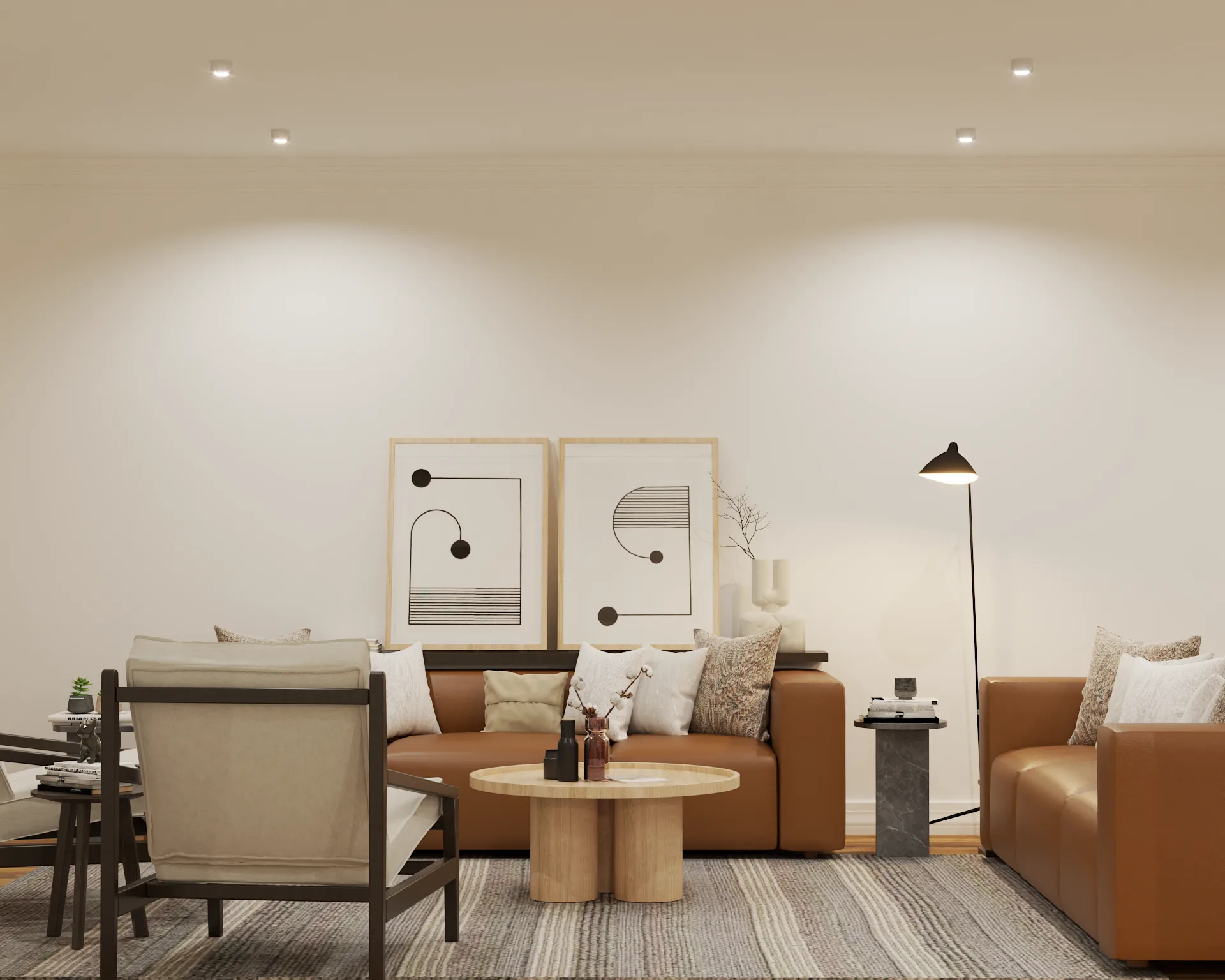 Front view of caramel leather sofas with abstract art and travertine table