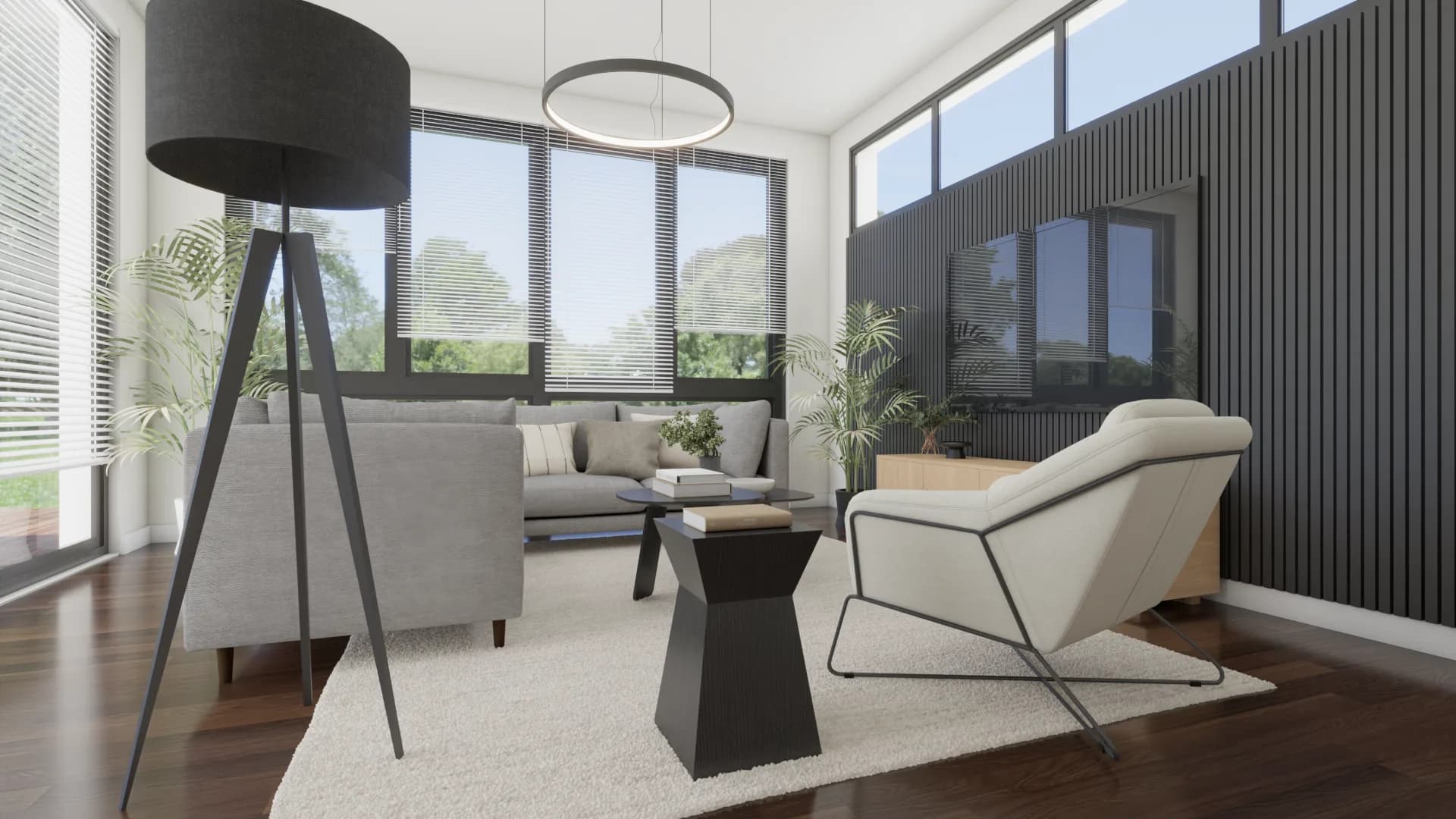 Black tripod floor lamp in the foreground with the gray sectional, dark slat wall TV panel, and whit