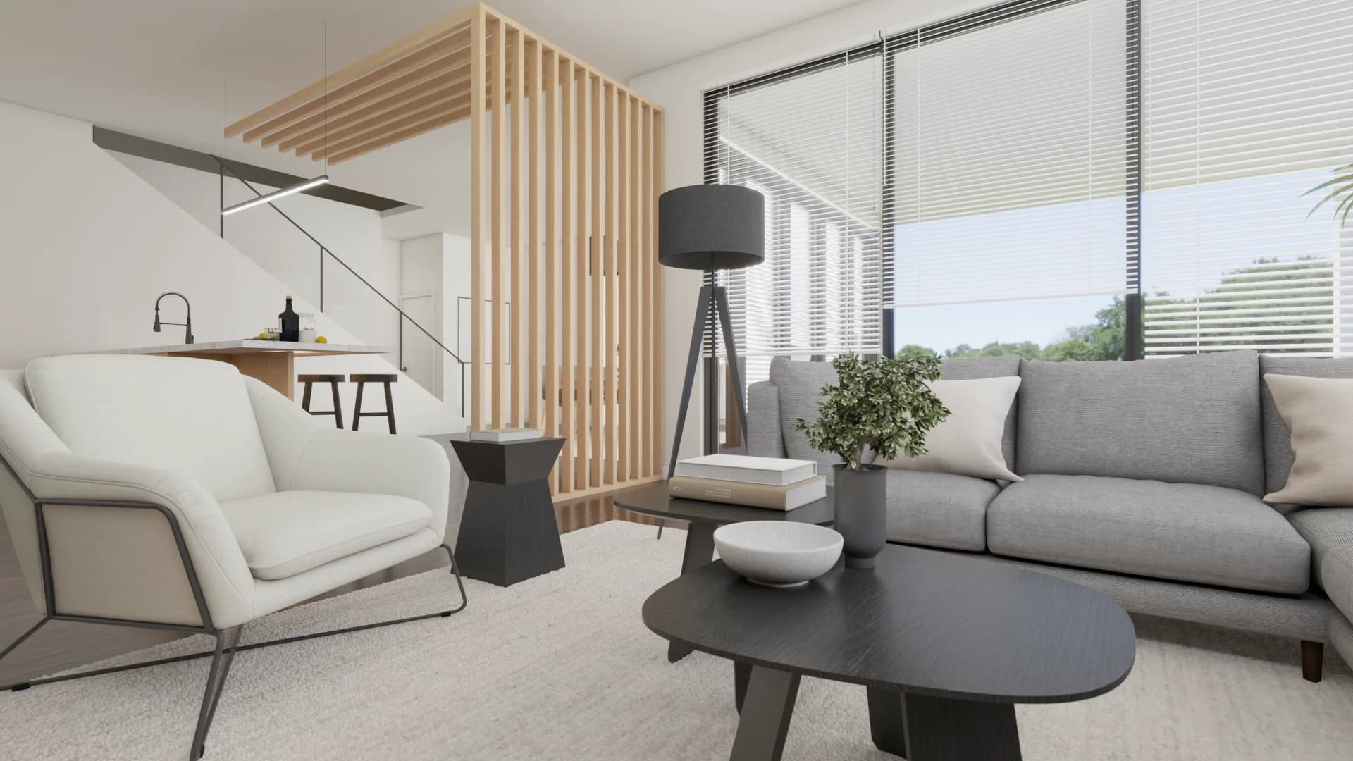 Open-plan living room showing the oak vertical slat stairway divider and the kitchen with bar stools