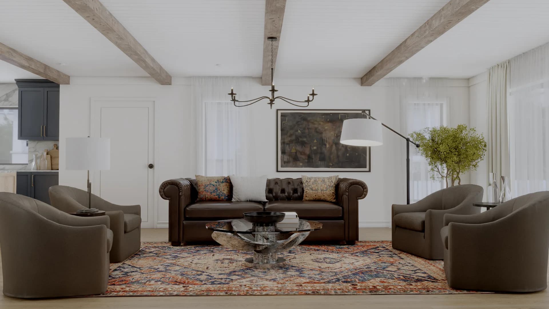 Full living room view with Chesterfield sofa, glass coffee table, wood beams, and open-plan kitchen visible