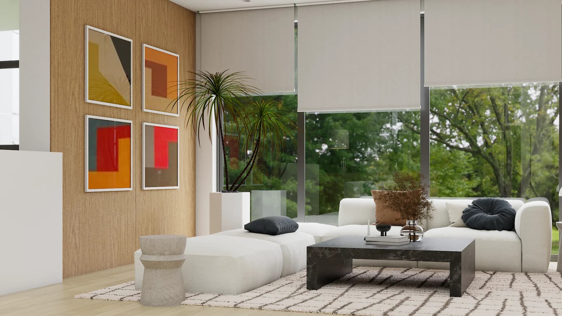 Close view of cream sectional, stone side stool, slate coffee table, and geometric art on oak wall
