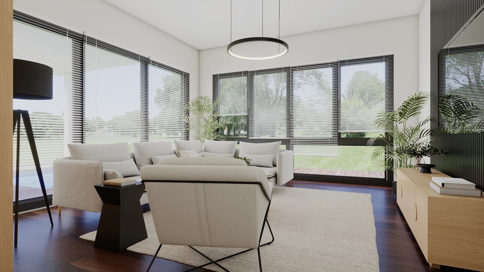 White paneled fireplace with gray sofas and dining area visible beyond