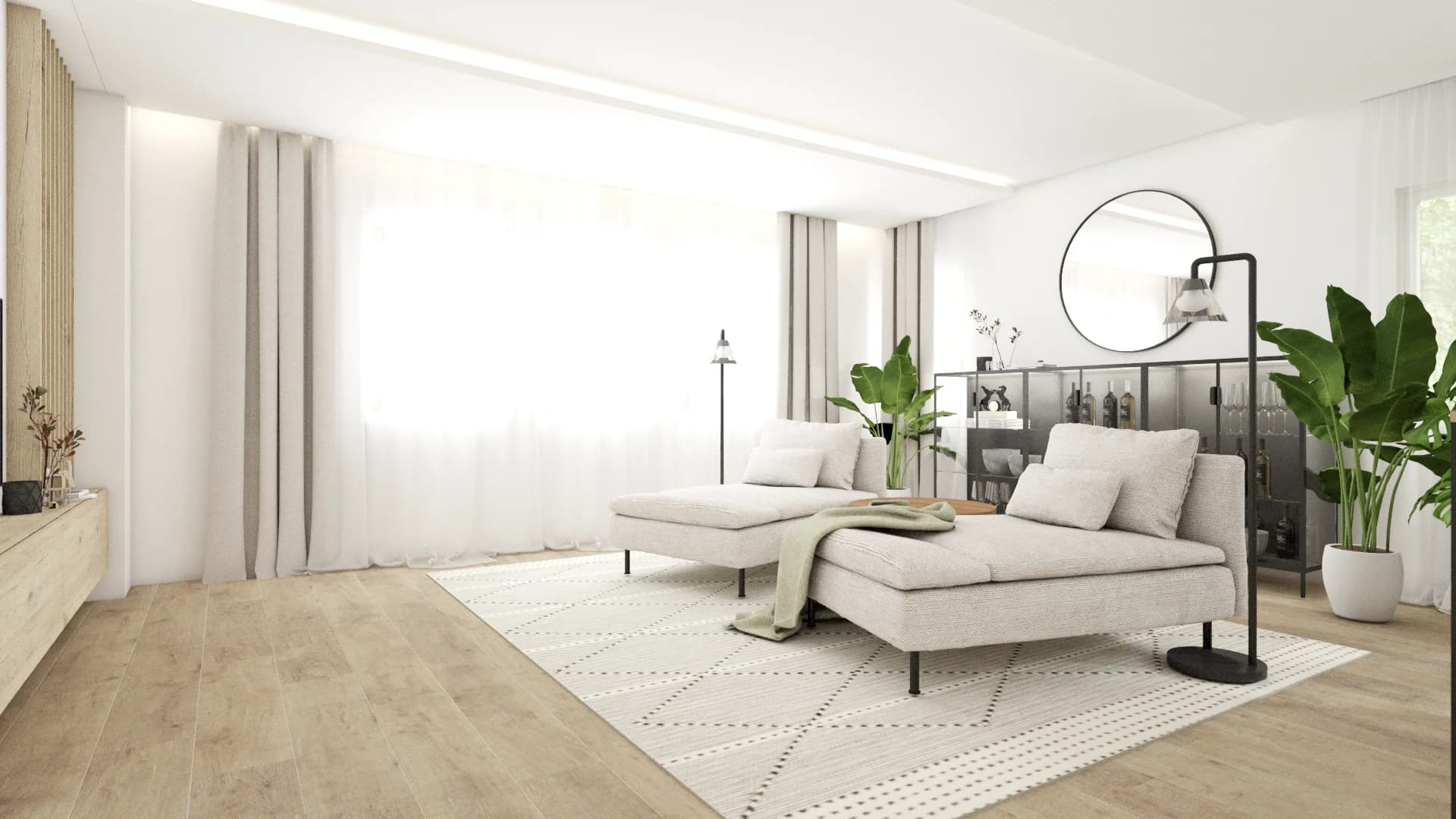 Wide loft view with two chaise lounges, green throw, round mirror, dark wine cabinet, and banana leaf plants