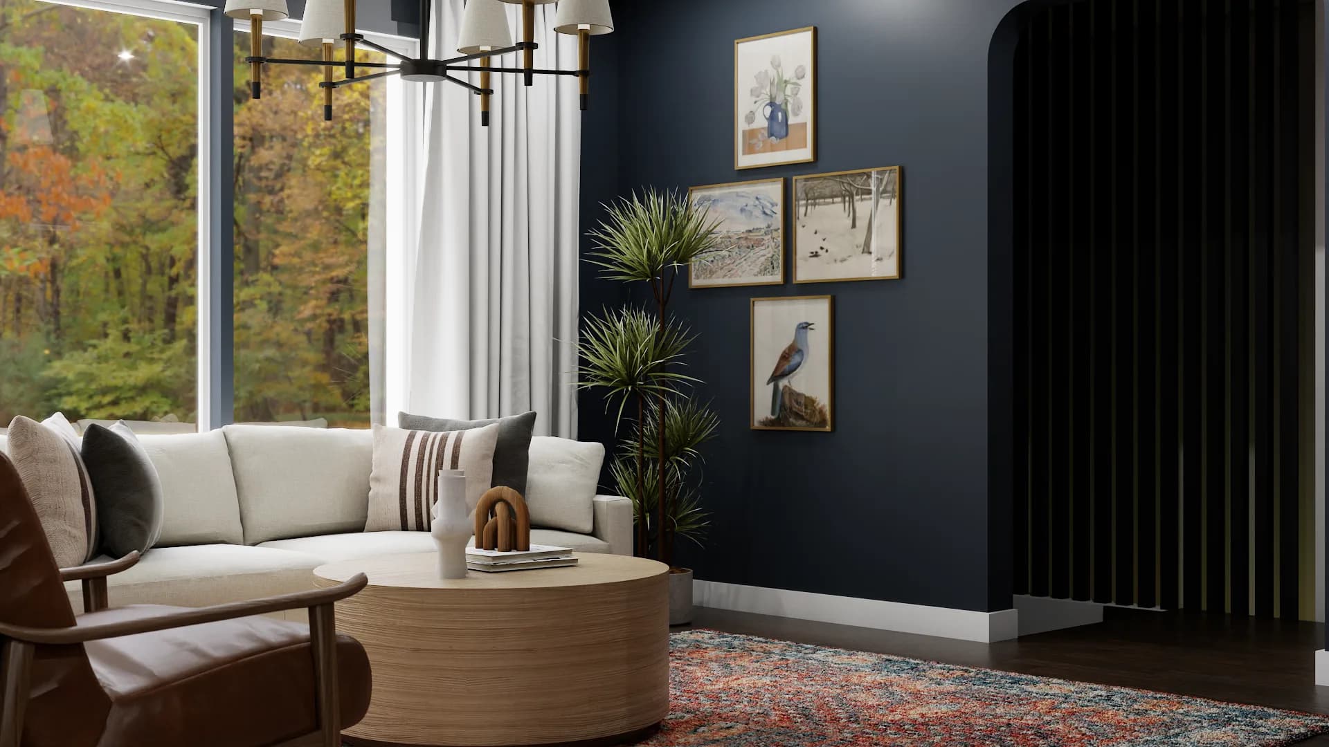 Gallery wall with framed bird painting and landscape art beside black vertical slat room divider in navy living room
