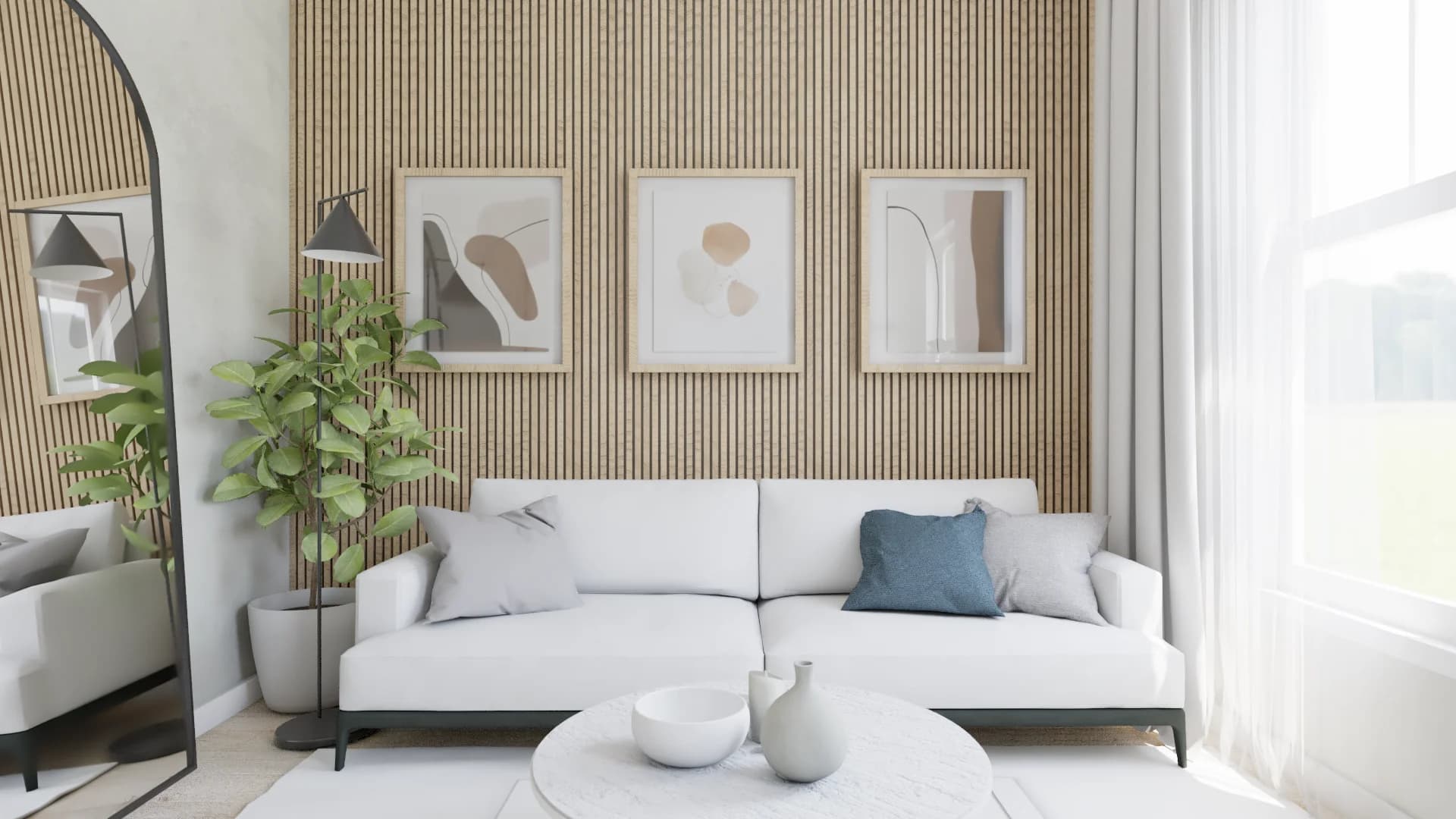White sofa against oak slat wall with three framed abstract prints, round white coffee table, arched mirror