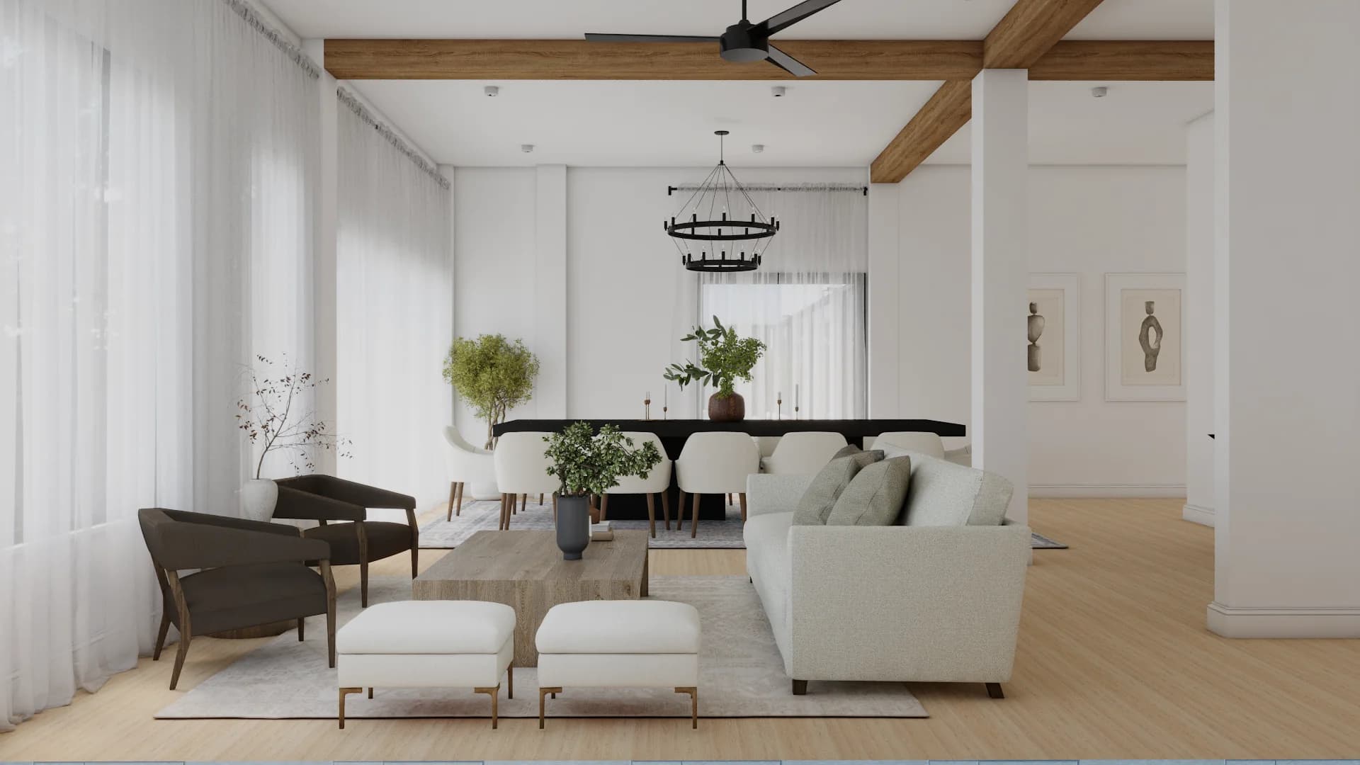 Open-plan living and dining area with wood beam ceiling, black iron double-ring chandelier, white sectional, walnut accent chairs, and sheer linen curtains