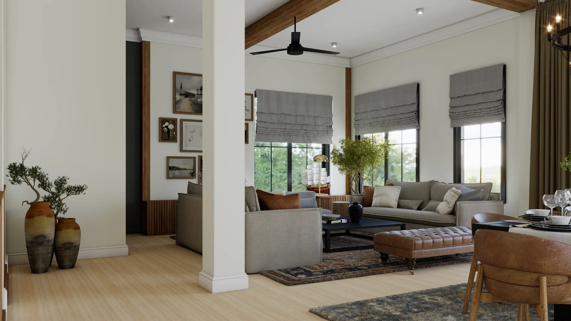 Open living room with white structural columns and oak ceiling beams, gray sectional sofa, leather bench, Roman shades, and black ceiling fan