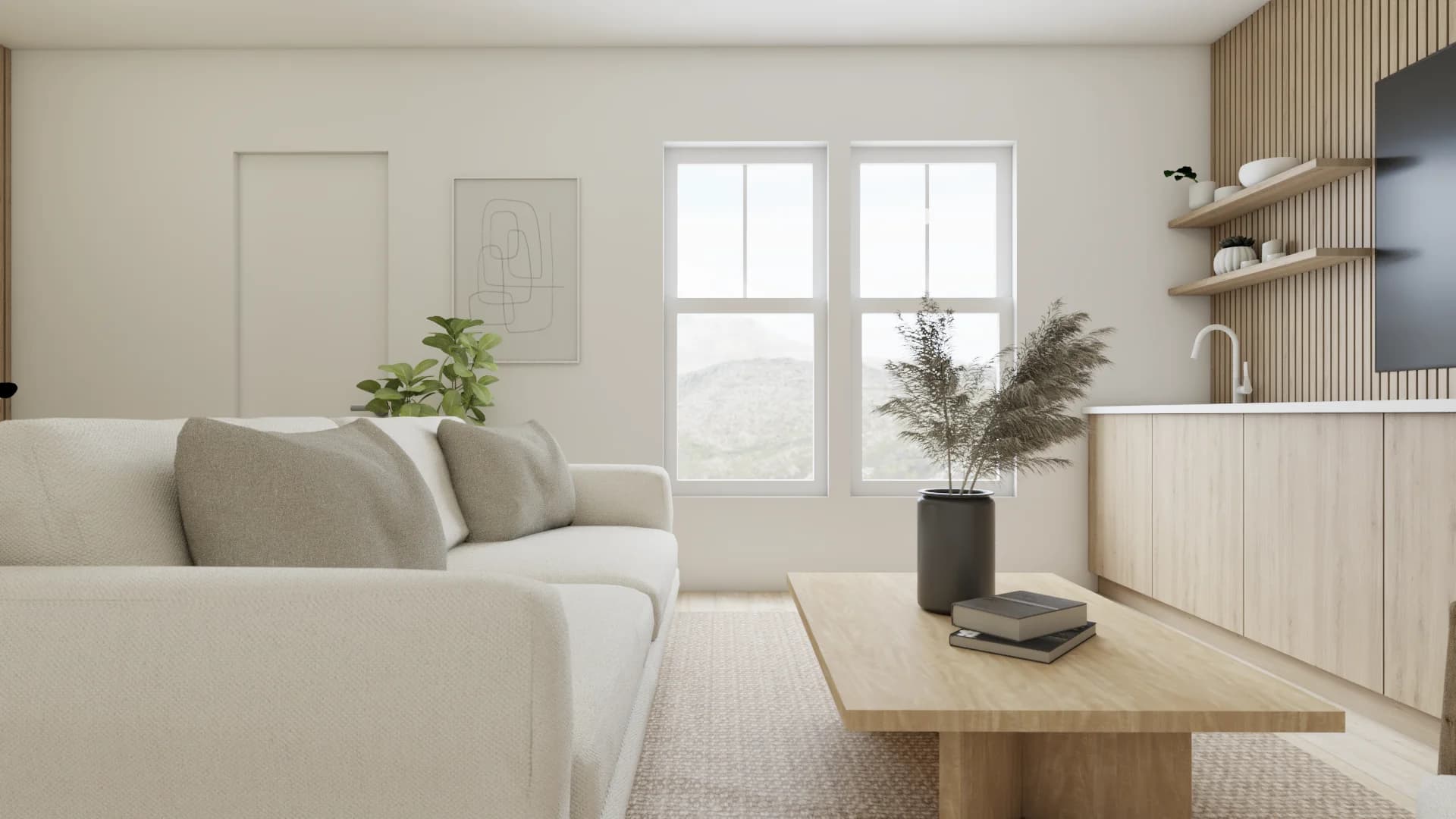 White linen sofa with gray cushions, line art wall print, pampas grass vase, and mountain window