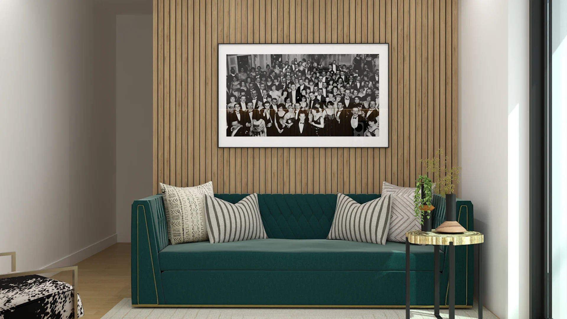 Teal velvet sofa with striped pillows and black and white crowd photo on wood slat wall