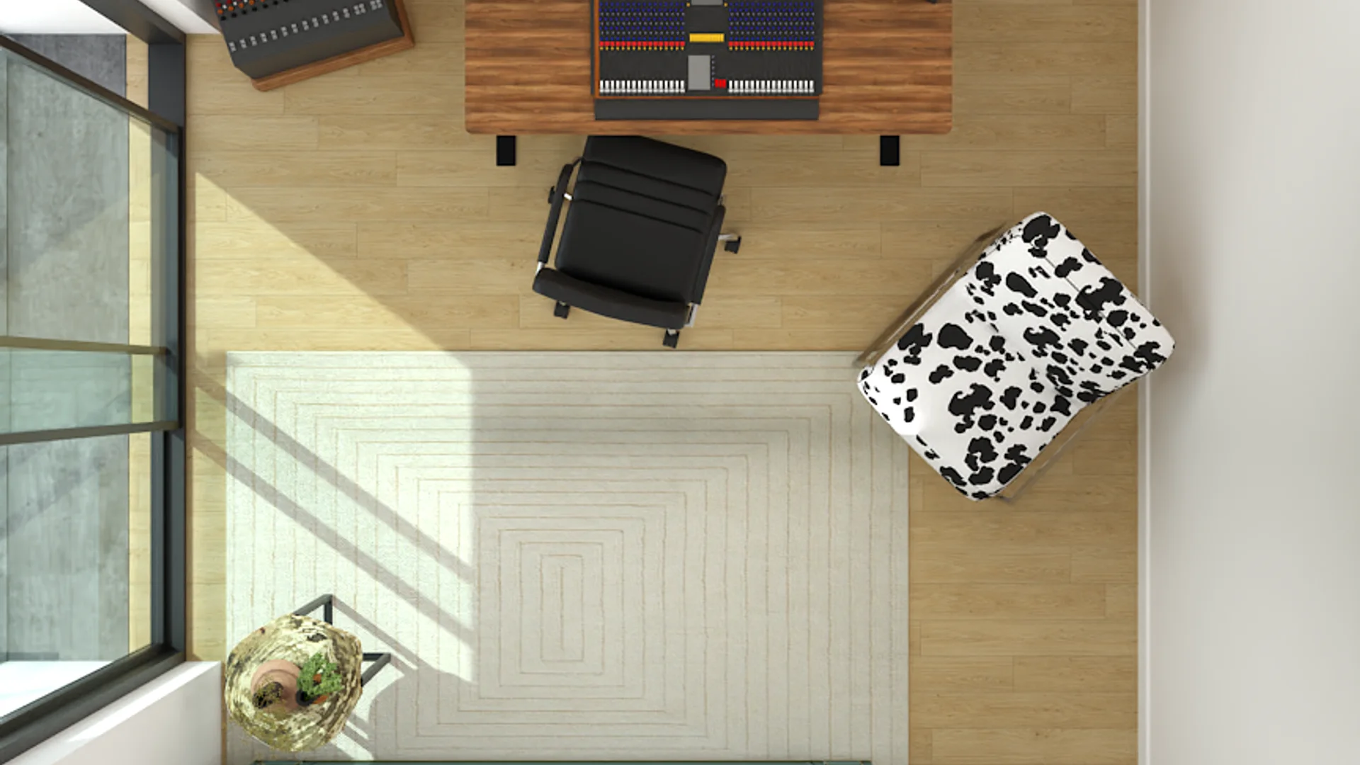Overhead view of mixing console on walnut desk, cow-print armchair, and geometric rug