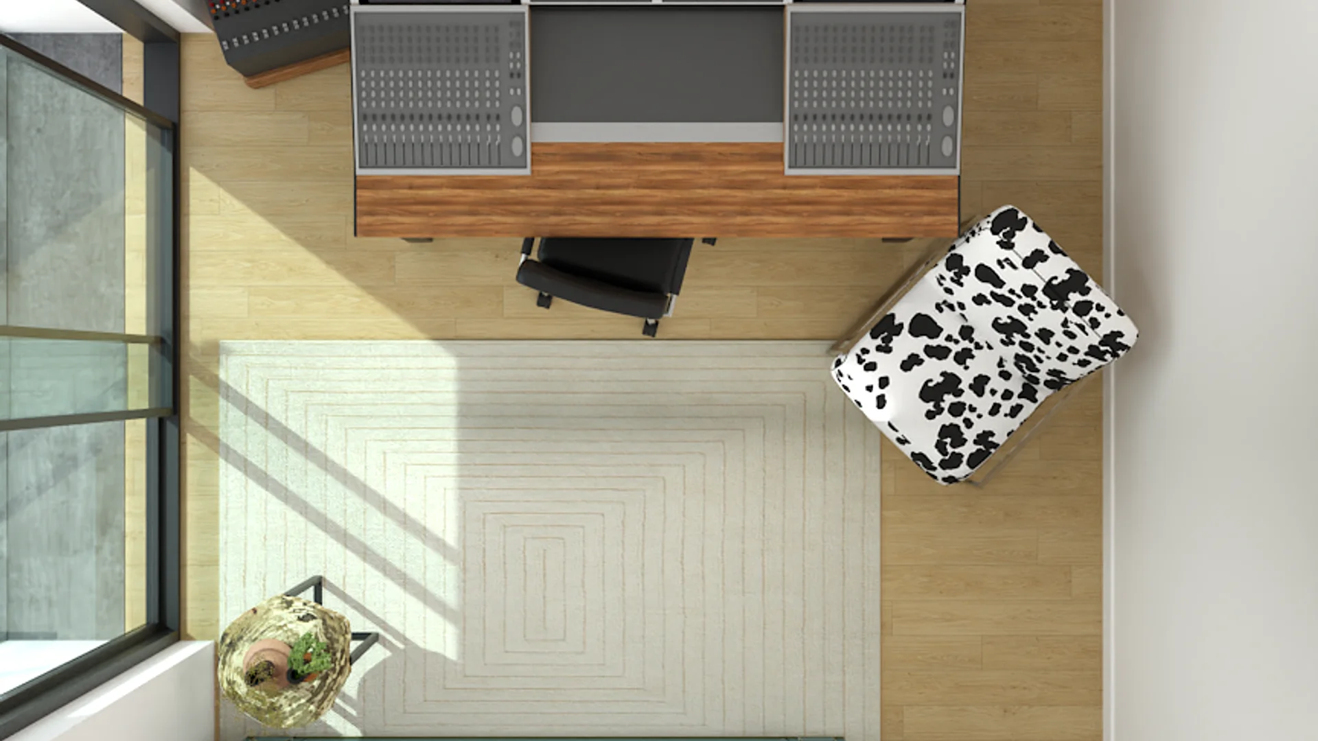 Top-down view of mixing console on walnut desk with cow-print chair and geometric rug