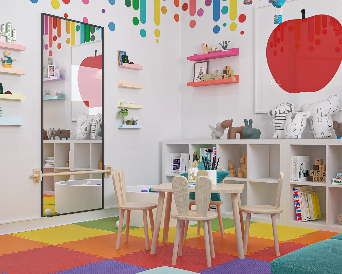 Wide playroom view showing red apple canvas focal wall, mirror, kids table, teal sofa, and rainbow foam tile floor