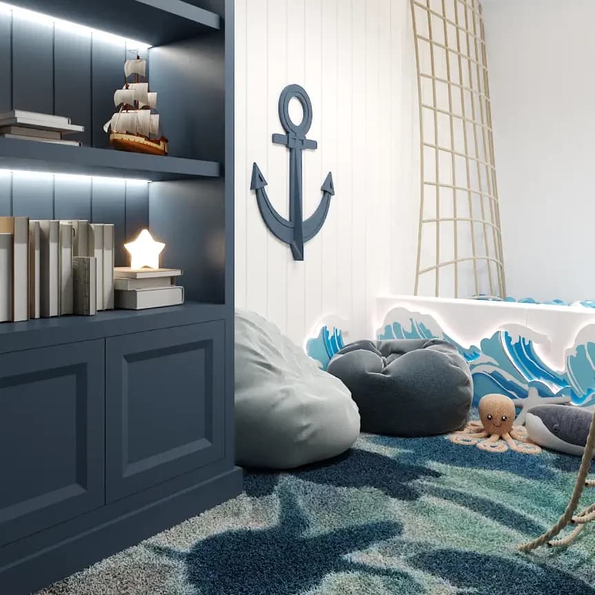 Nautical-inspired children's bedroom with anchor motifs and soft blue hues, designed by Debora, an online interior design service based in New York City.